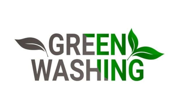 Greenwashing - text with leaves in lettering design. Environmental myths